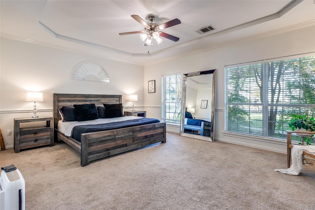 1110 Hart Road Fairview, TX 75069 - Photo 6 of 13 a bedroom with furniture and a large window