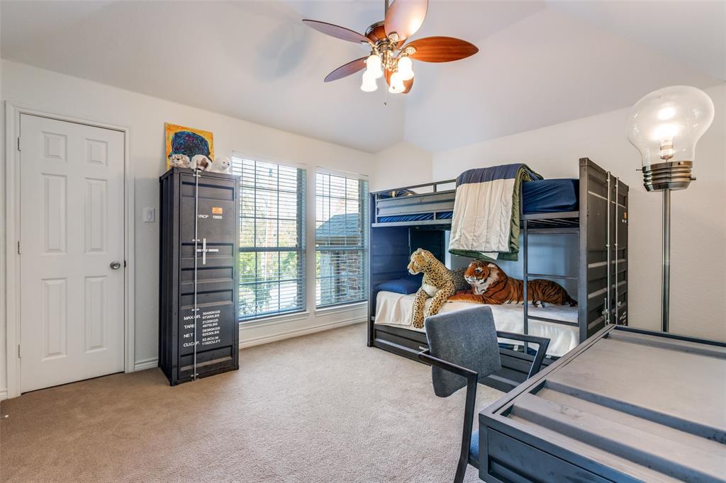1110 Hart Road Fairview, TX 75069 - Photo 10 of 13 a bed room with furniture and a window
