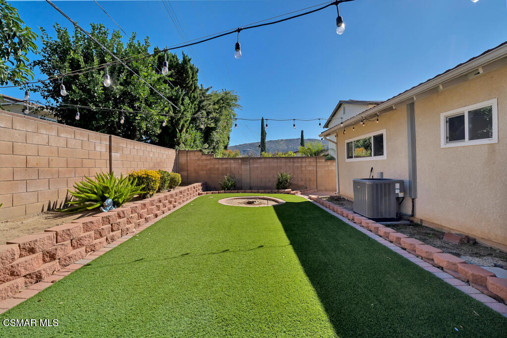 2224 Alscot Avenue Simi Valley, CA 93063 - Photo 21 of 34 a swimming pool with outdoor seating and yard