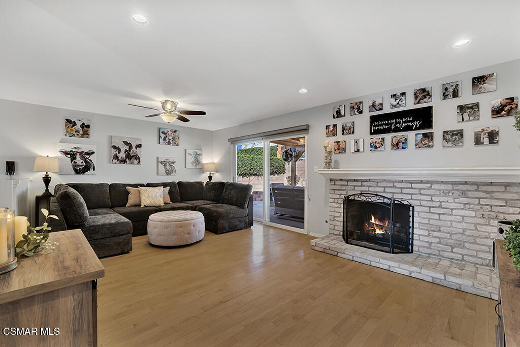 2224 Alscot Avenue Simi Valley, CA 93063 - Photo 3 of 34 a living room with furniture and a fireplace