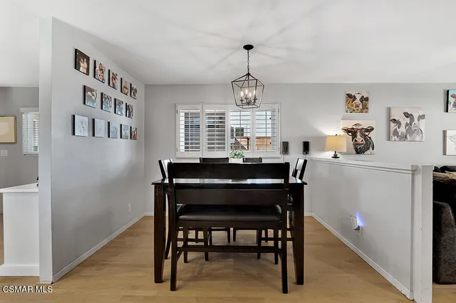 a room with a table and chairs