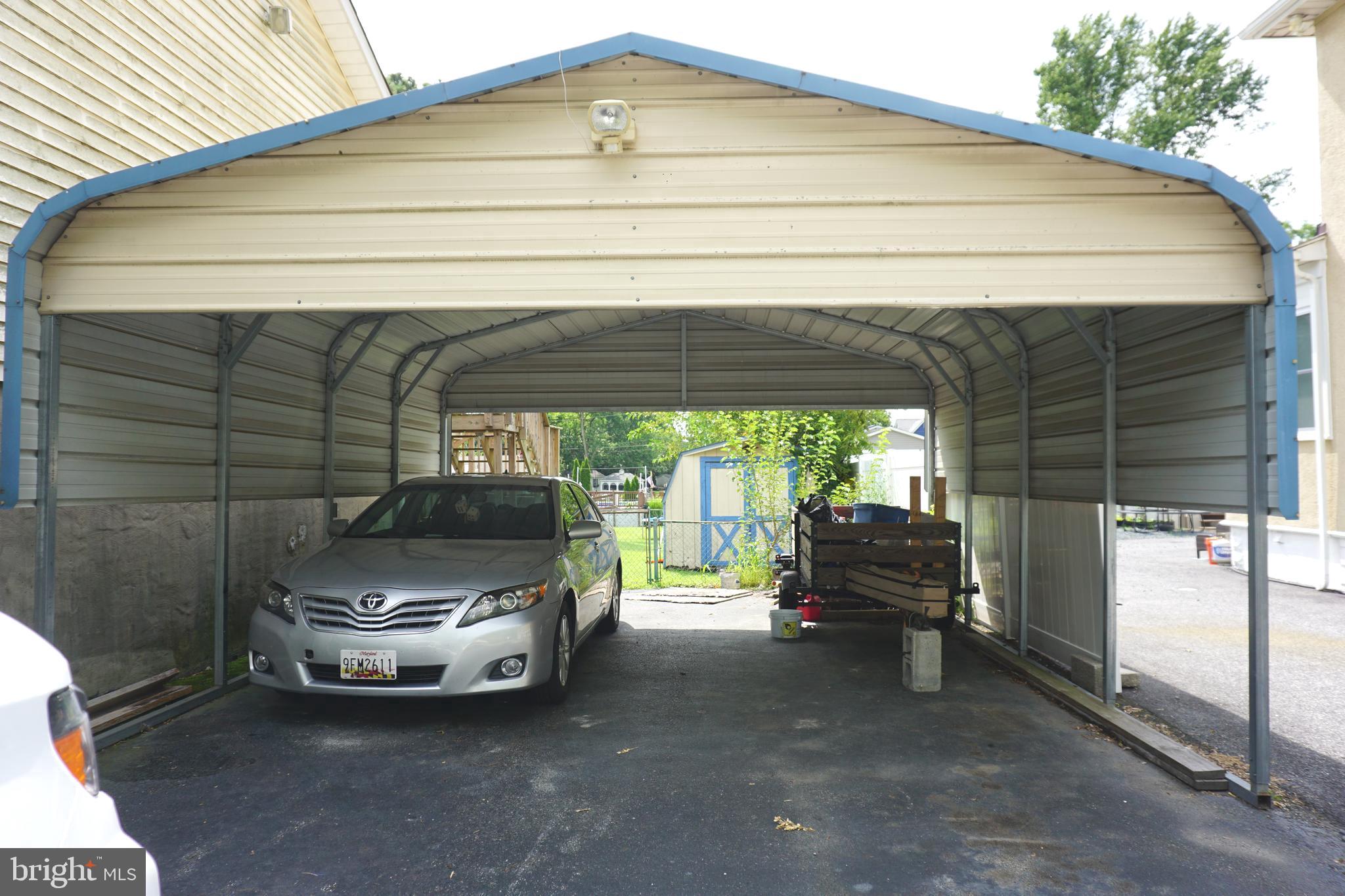 8610 Oak Road Sparrows Point, MD 21219 - Photo 40 of 59 a car parked in front of house