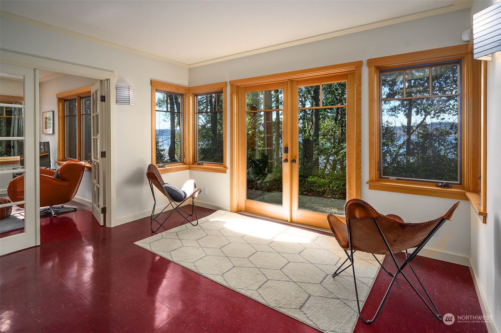 13629 Burma Road Southwest Vashon, WA 98070 - Photo 24 of 39 a bedroom with furniture and a large window