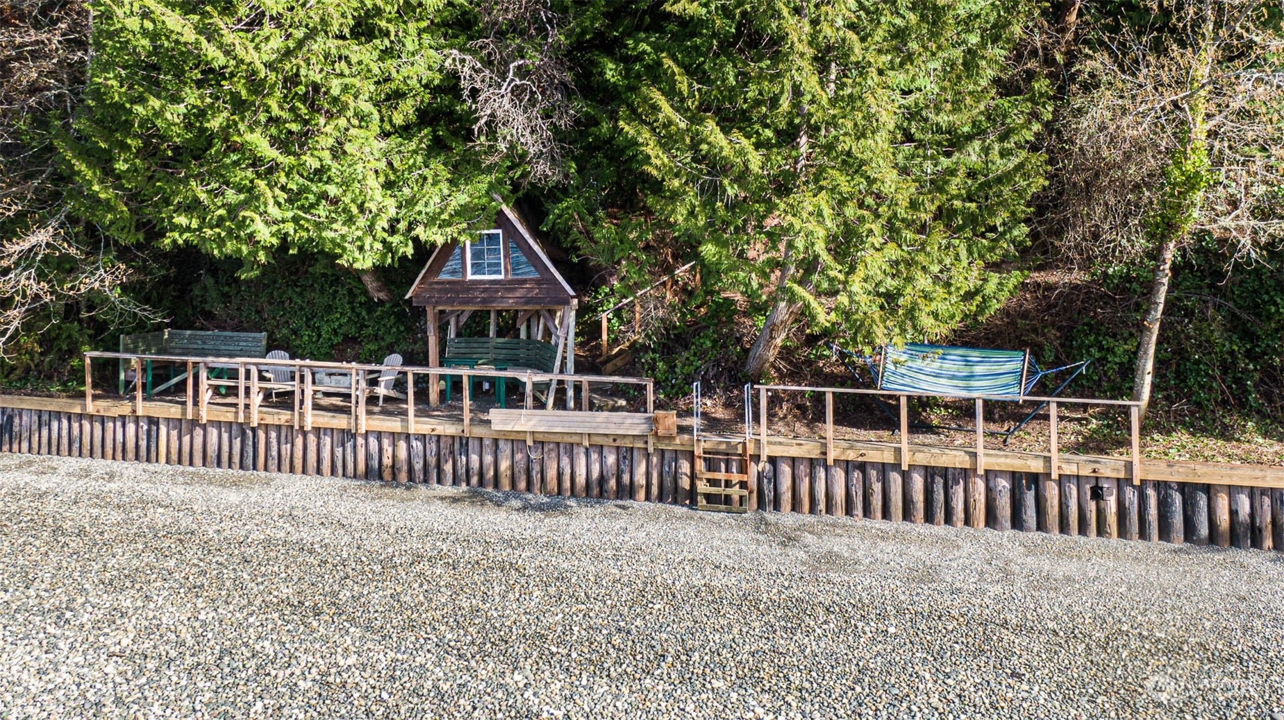 13629 Burma Road Southwest Vashon, WA 98070 - Photo 36 of 39 a view of a house with a deck