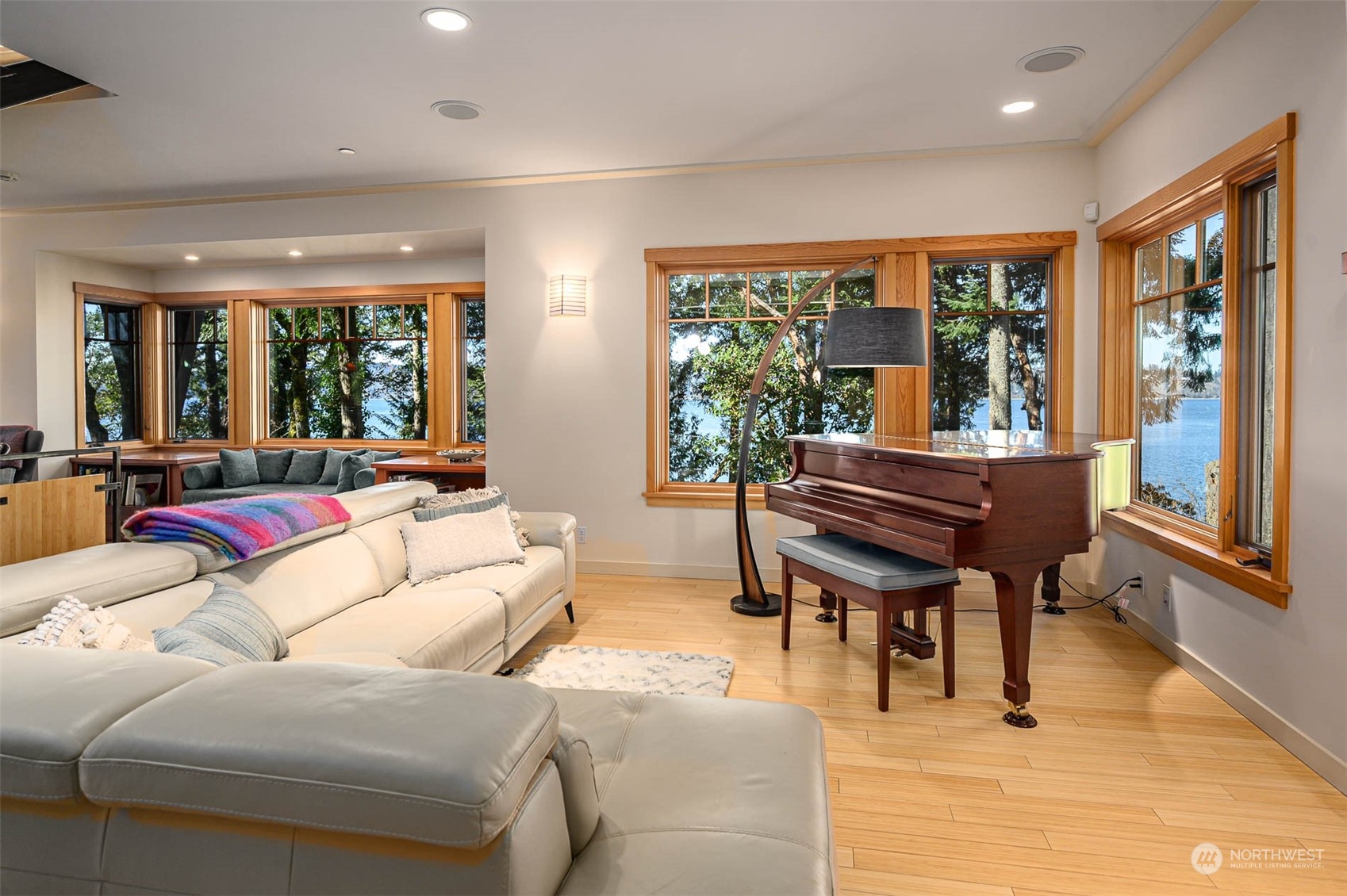 13629 Burma Road Southwest Vashon, WA 98070 - Photo 6 of 39 a living room with furniture and a large window