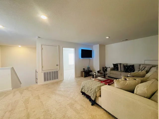 a bathroom with a shower and toilet