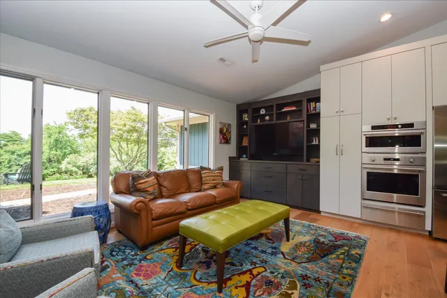 a kitchen with sink cabinets and window