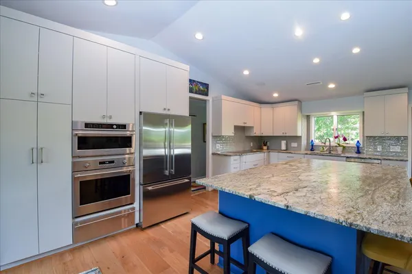 a bathroom with a shower and a tub