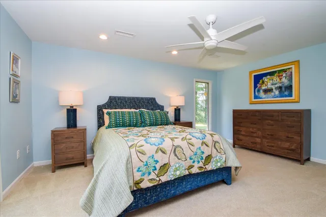 a view of backyard with garden and trees