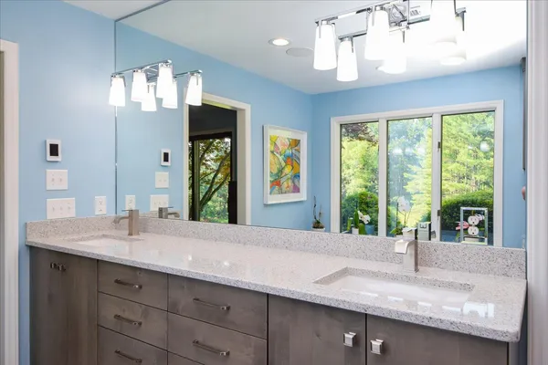 a view of a bathroom with a shower curtain