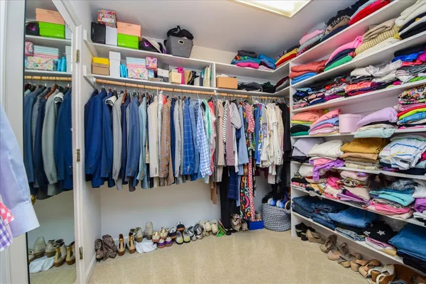 a view of a swimming pool with a yard