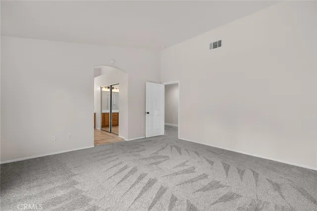 a view of a balcony with trees