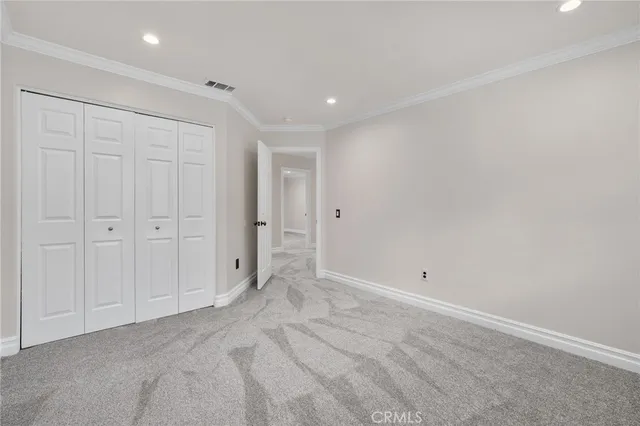 a bathroom with a granite countertop sink and mirror