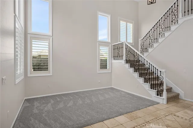 a view of staircase with wooden floor and stairs