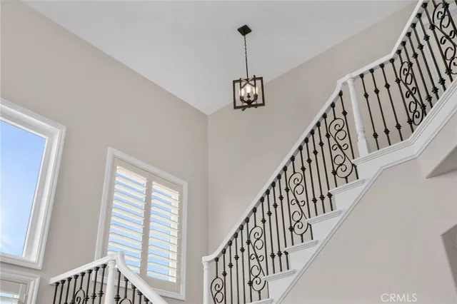 a open kitchen with a sink a stove and a refrigerator