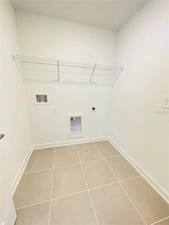 11732 Language Way Orlando, FL 32832 - Photo 23 of 24 a view of a room with an empty space and a window