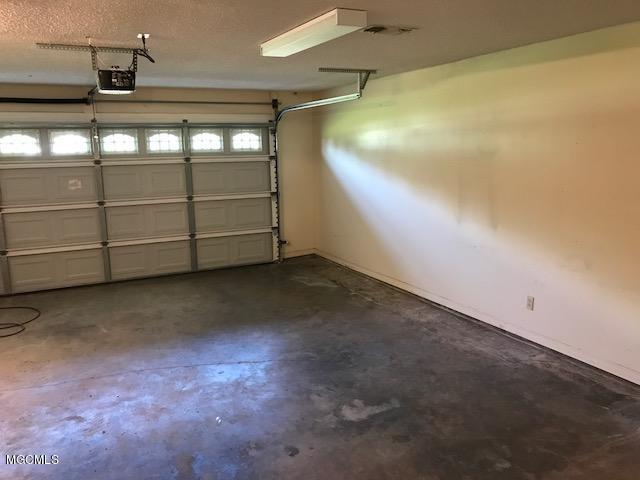 10643 Firetower Road Pass Christian, MS 39571 - Photo 21 of 31 Garage