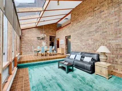 a outdoor living space with furniture and a fireplace