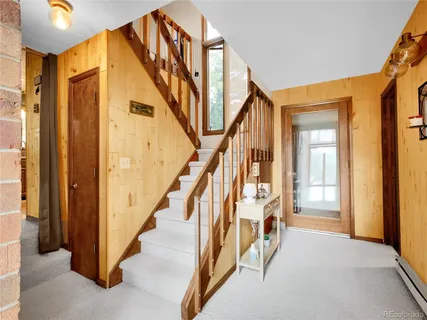 a view of an entryway with staircase