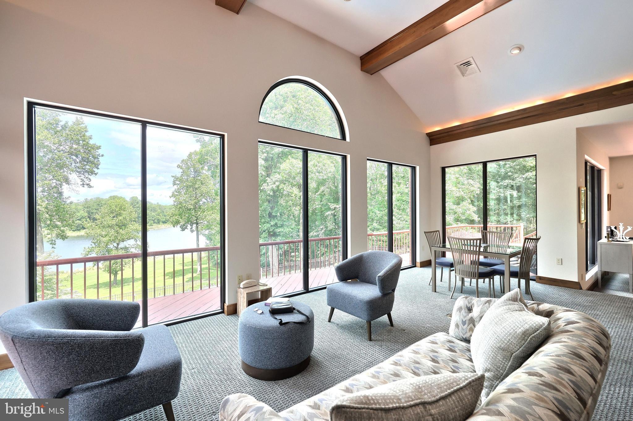 174 Springhouse Lane Spring Grove, PA 17362 - Photo 54 of 95 seating area overlooking pool and lake