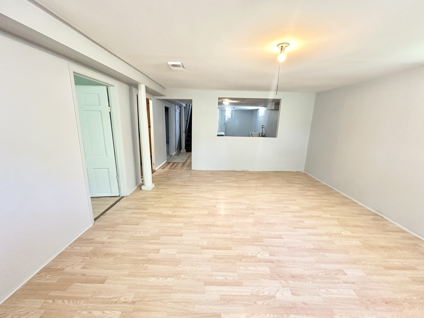 301 Illinois Avenue Elgin, IL 60120 - Photo 11 of 14 a view of an empty room with a window