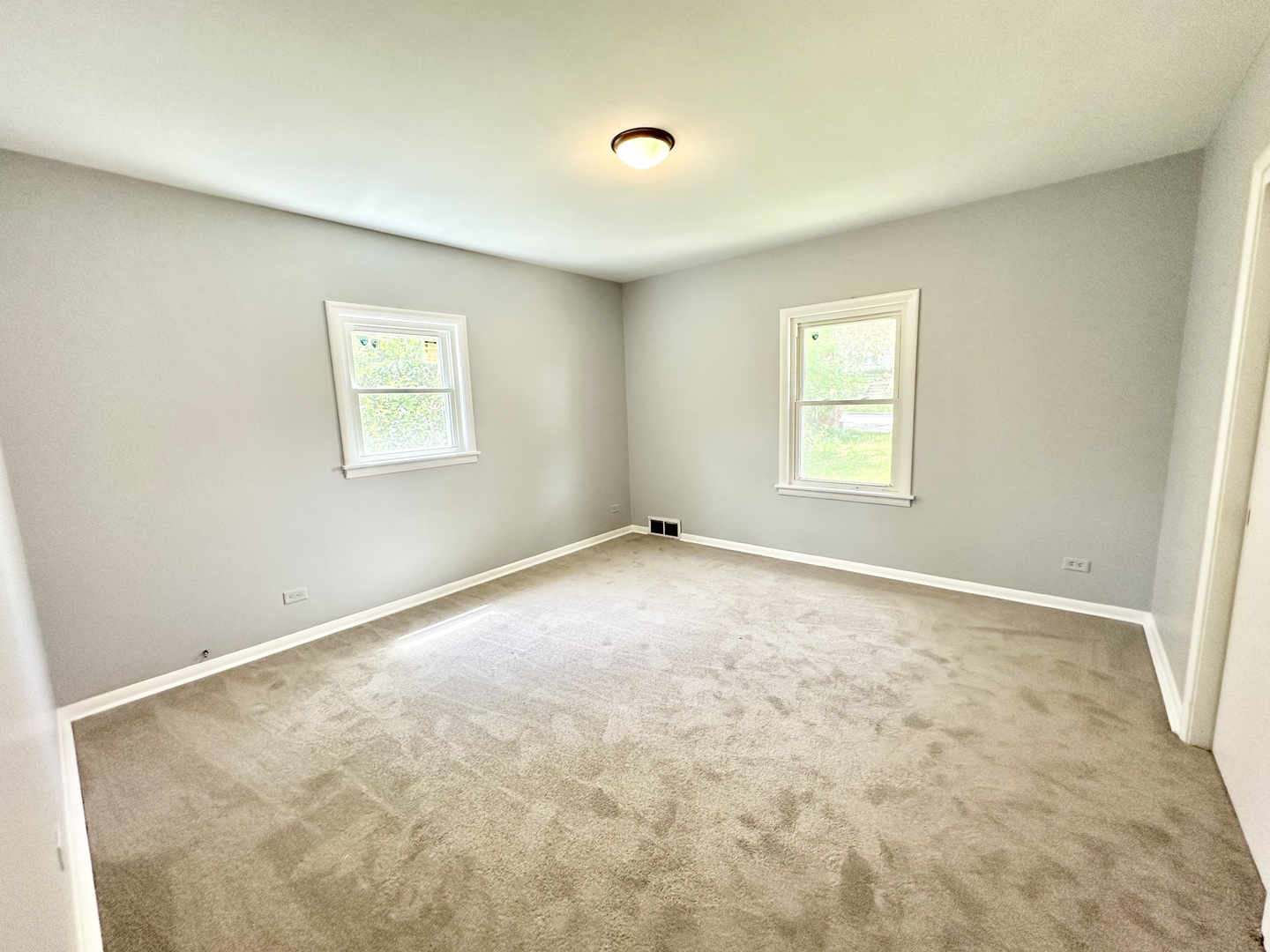 301 Illinois Avenue Elgin, IL 60120 - Photo 7 of 14 a view of an empty room with a window