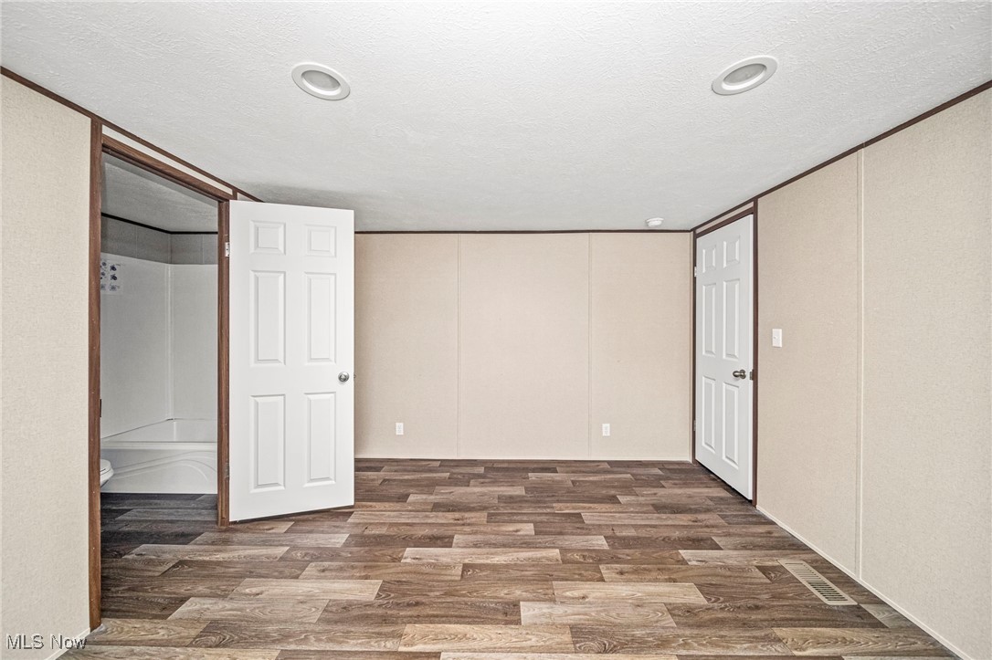 3583 Austin Road, Unit 130 Geneva, OH 44041 - Photo 21 of 27 Primary Bedroom