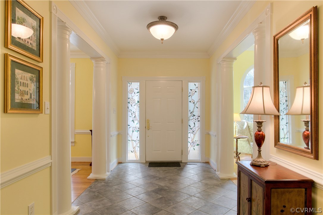 902 Hermitage Road Manakin-Sabot, VA 23103 - Photo 4 of 44 The Foyer has chair rail, stained glass sidelights