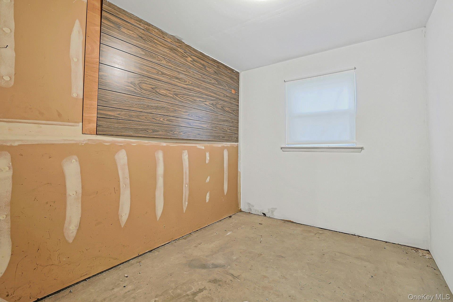 60 Pine Street Ardsley, NY 10607 - Photo 35 of 43 This Spacious Storage Room is Conveniently Located at the Rear of the 2 Car Garage