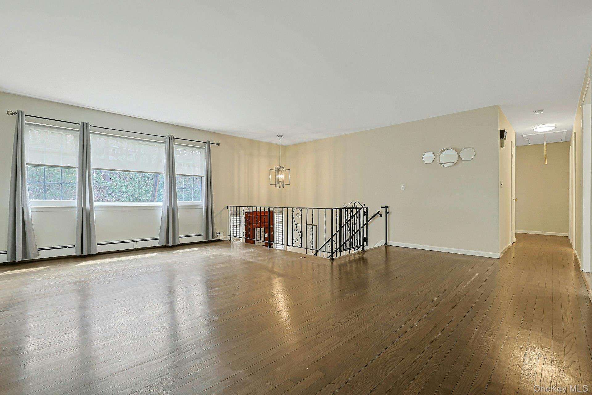 60 Pine Street Ardsley, NY 10607 - Photo 5 of 43 Beautiful Hardwood Floors Throughout and Hallway to the Bedrooms in the Background