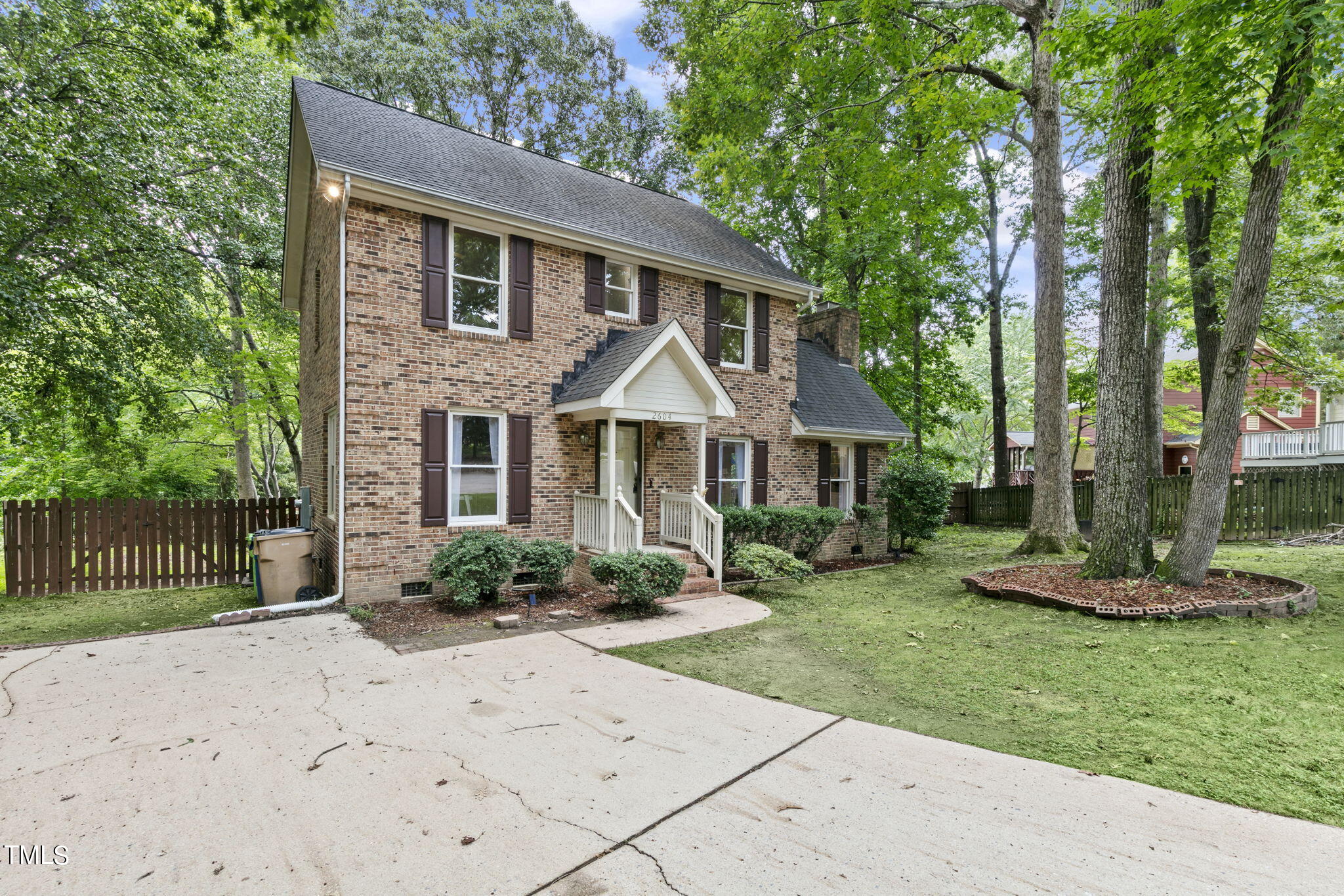 2604 Diamondhitch Trail Raleigh, NC 27615 - Photo 3 of 39 a front view of a house with a garden