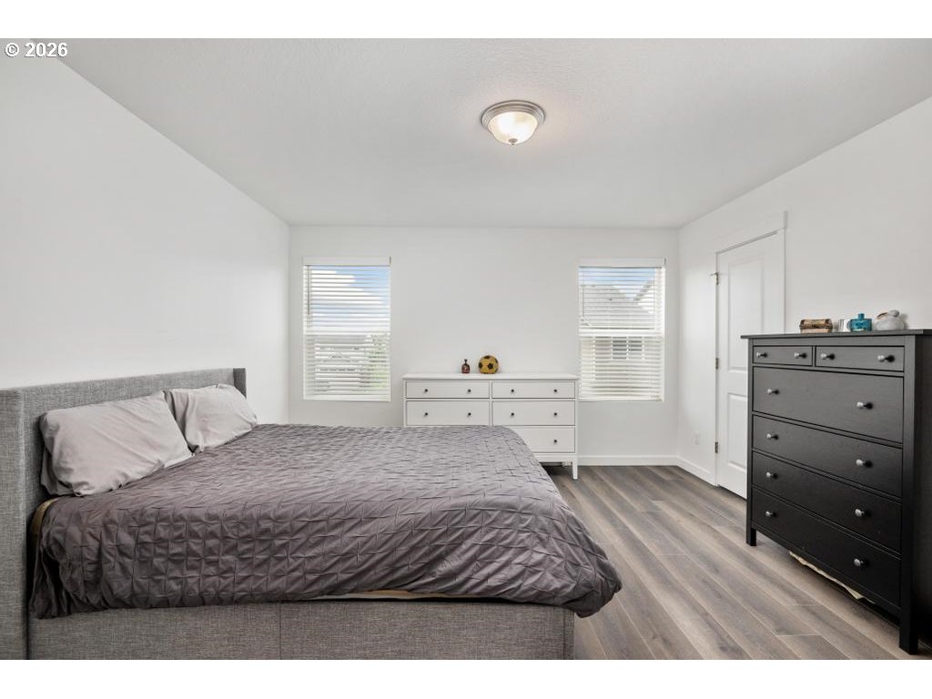 859 South 23rd Avenue Cornelius, OR 97113 - Photo 14 of 39 a bedroom with a bed and a dresser