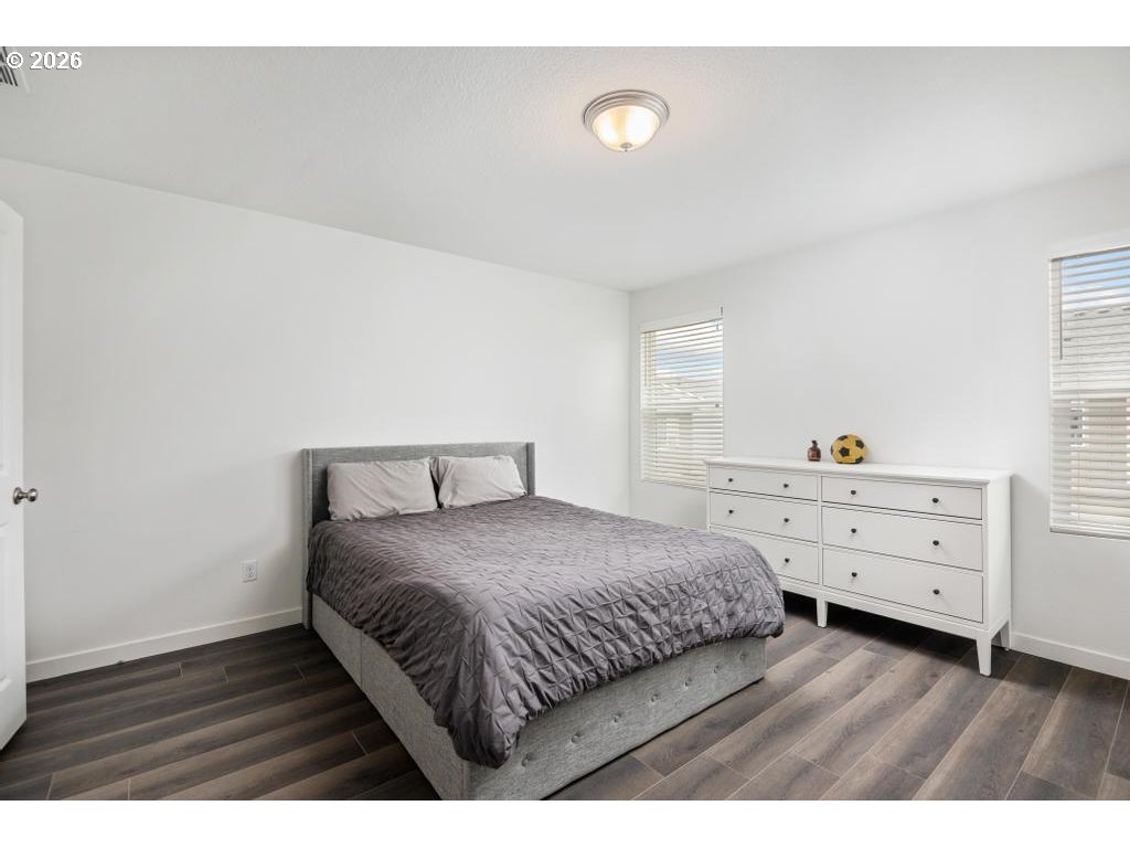 859 South 23rd Avenue Cornelius, OR 97113 - Photo 16 of 39 a bedroom with a bed and a dresser