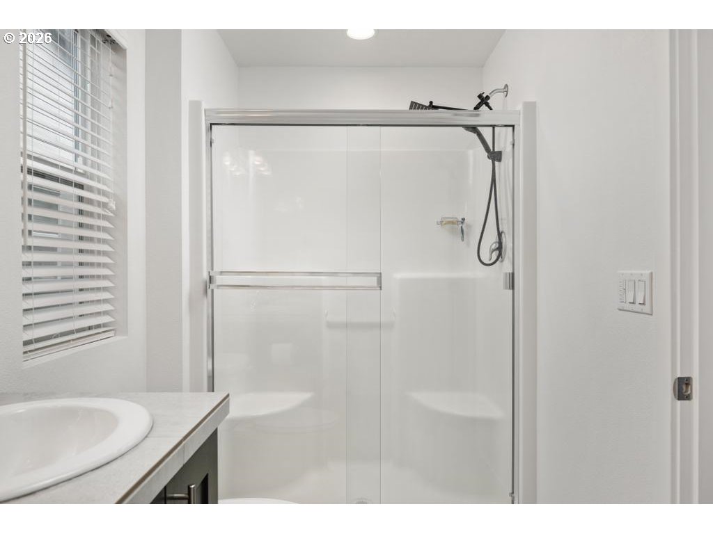 859 South 23rd Avenue Cornelius, OR 97113 - Photo 21 of 39 a bathroom with a granite countertop shower and a sink
