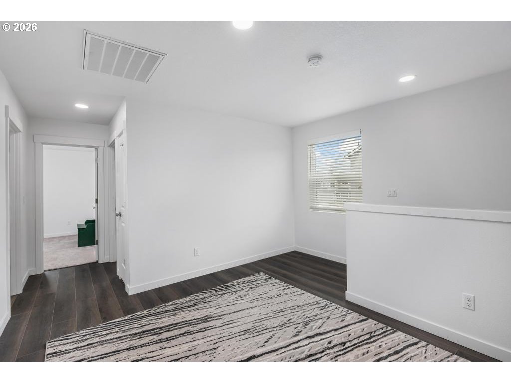 859 South 23rd Avenue Cornelius, OR 97113 - Photo 24 of 39 a view of wooden floor in an empty room