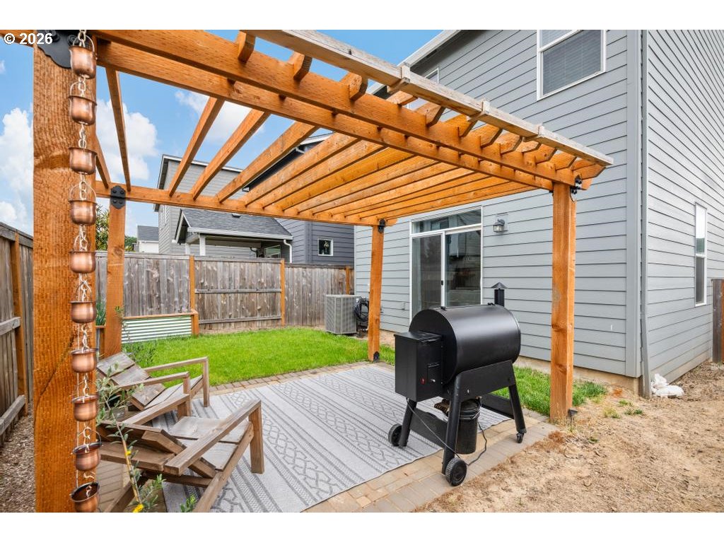 859 South 23rd Avenue Cornelius, OR 97113 - Photo 35 of 39 a backyard of a house with table and chairs