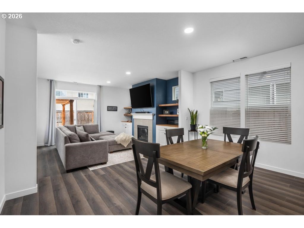 859 South 23rd Avenue Cornelius, OR 97113 - Photo 5 of 39 a view of a dining room with furniture window and wooden floor