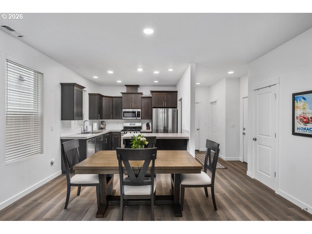 859 South 23rd Avenue Cornelius, OR 97113 - Photo 6 of 39 a view of kitchen with dining table and chairs
