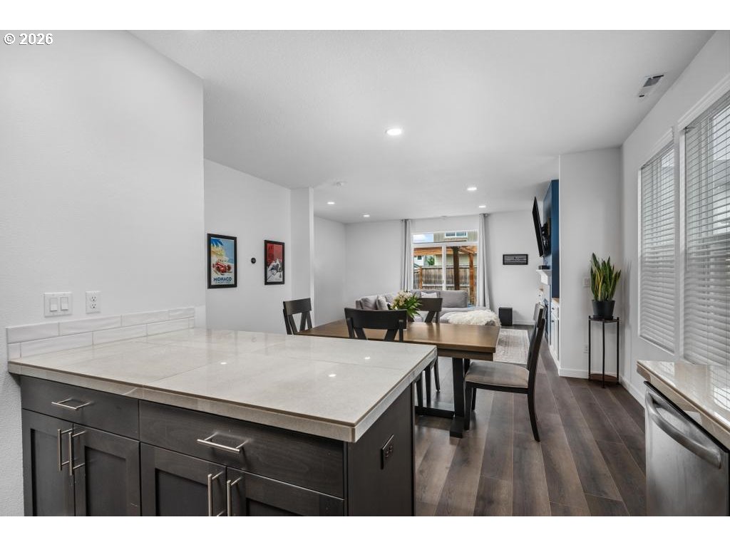 859 South 23rd Avenue Cornelius, OR 97113 - Photo 7 of 39 a view of a dining room with furniture and wooden floor