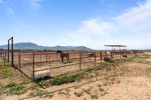 a view of an ocean beach and mountain