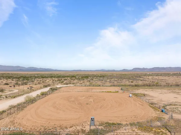 a view of an ocean beach and mountain