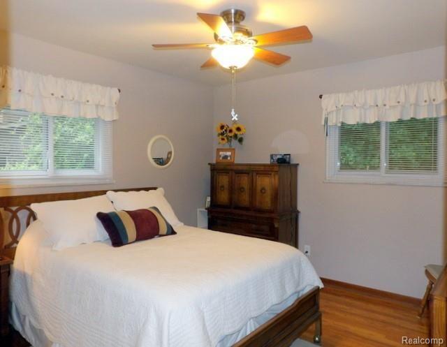 8750 Rucker Road Grosse Ile, MI 48138 - Photo 37 of 54 BEDROOM #2 WITH NEUTRAL PAINT COLOR AND HARDWOOD FLOOR!