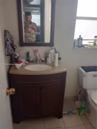 a bathroom with a sink and a toilet