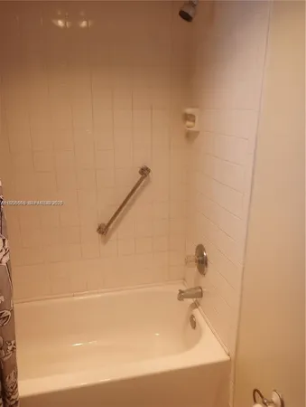 a bathroom with a bathtub