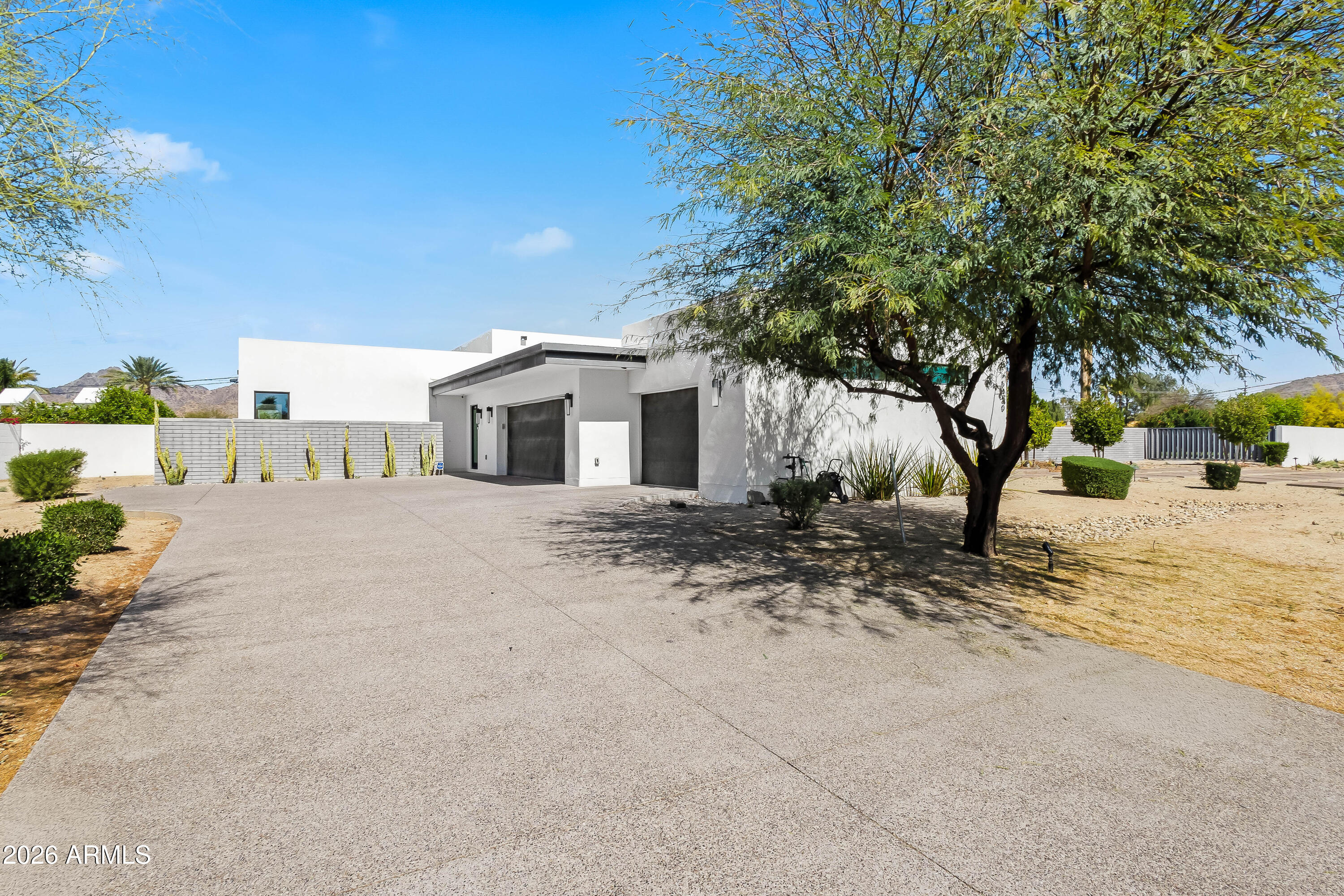 5430 North 41st Street Phoenix, AZ 85018 - Photo 38 of 38 a front view of a house with a yard