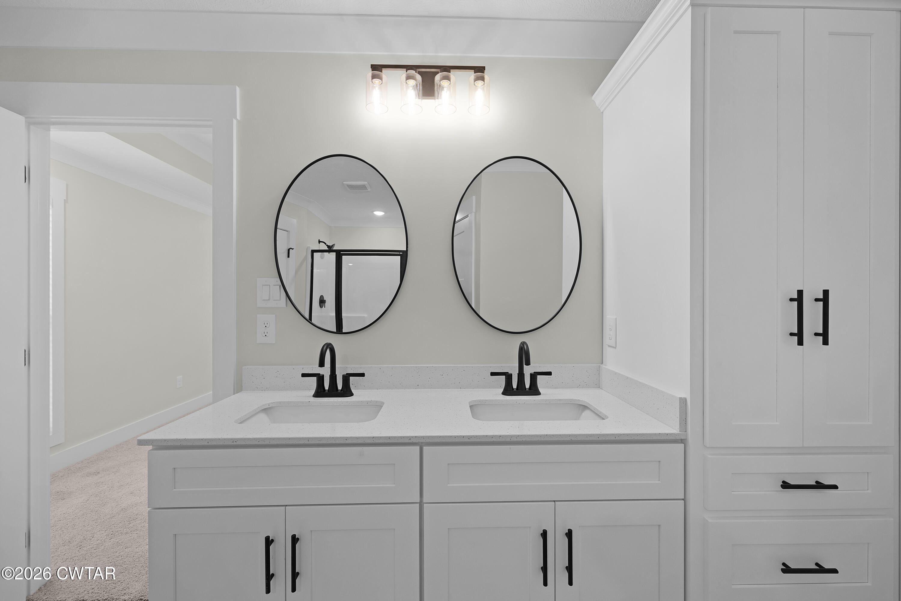 404 Fairway Boulevard Jackson, TN 38305 - Photo 12 of 16 a bathroom with a sink and a mirror
