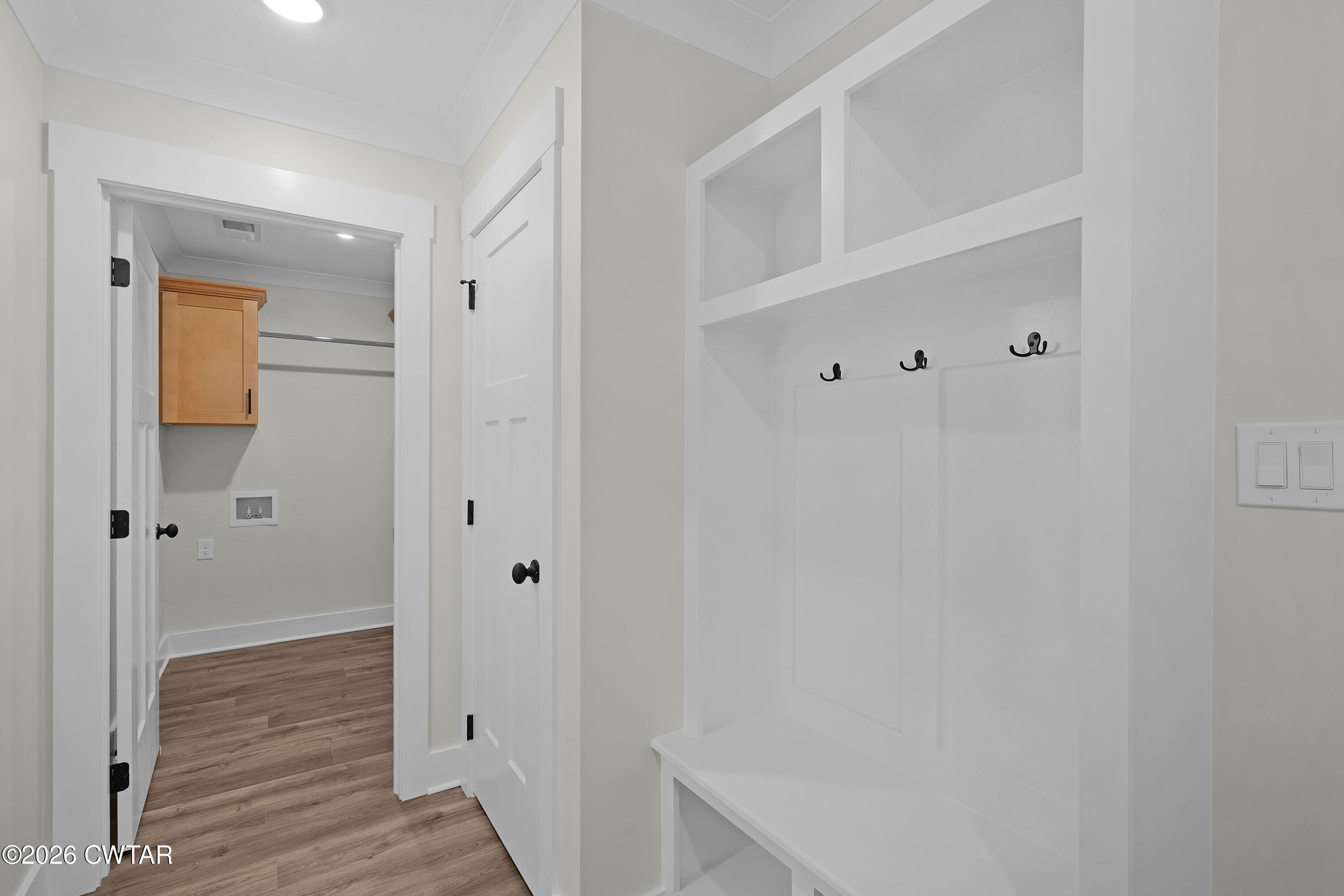 404 Fairway Boulevard Jackson, TN 38305 - Photo 8 of 16 a view of a hallway with wooden floor