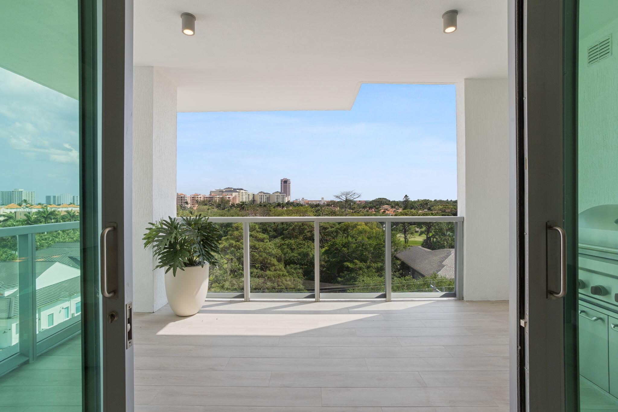 475 East Royal Palm Road, Unit 605 Boca Raton, FL 33432 - Photo 8 of 62 LIVING TO BALCONY VIEW