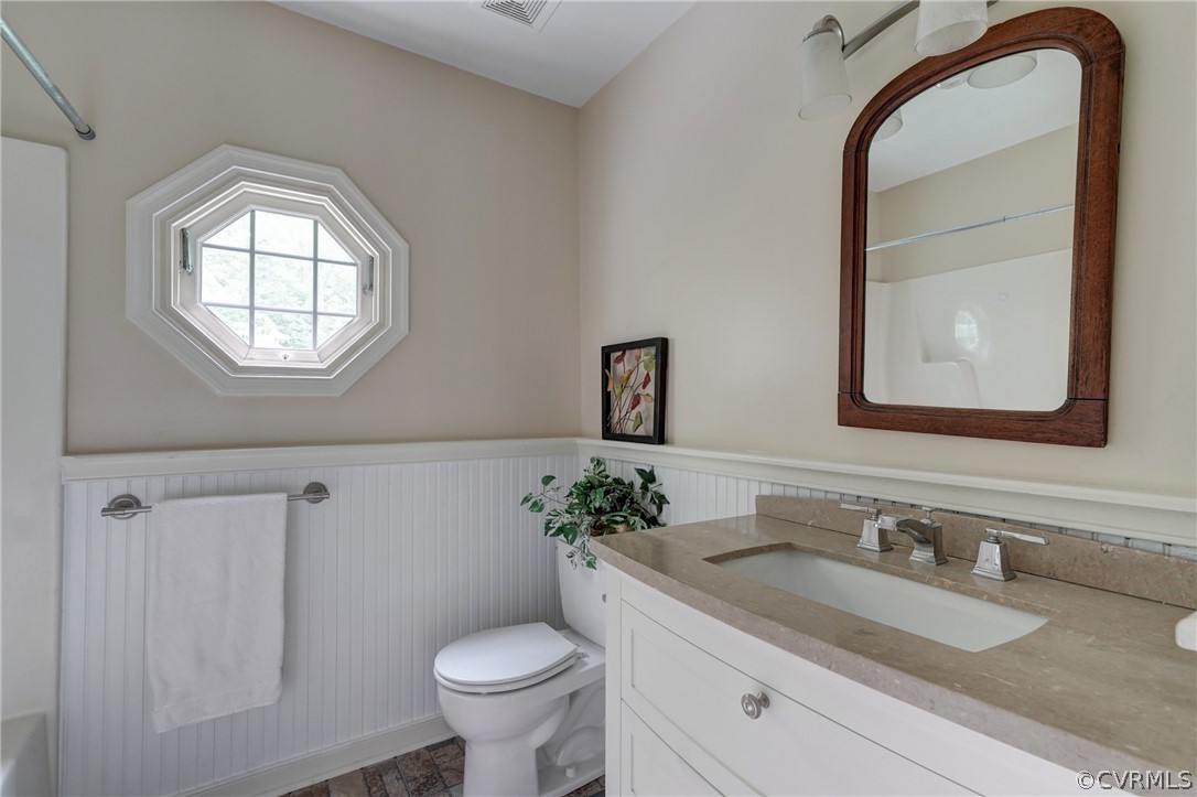 13630 Edmonthorpe Road Midlothian, VA 23113 - Photo 26 of 30 The renovated Hall Bath offers tile flooring, bead