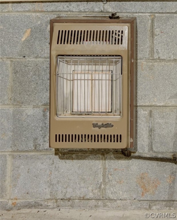 13630 Edmonthorpe Road Midlothian, VA 23113 - Photo 29 of 30 The built-in gas heater in the basement workshop a